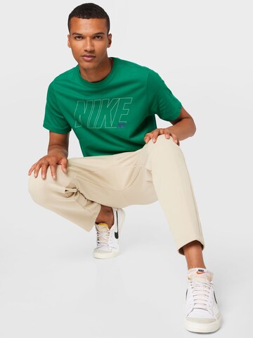 Slimfit Pantaloni cu buzunare de la Nike Sportswear pe maro