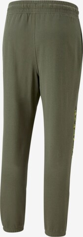 PUMA Tapered Sportbroek in Groen