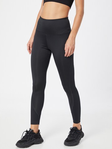 Skinny Pantaloni sport de la Reebok pe negru: față