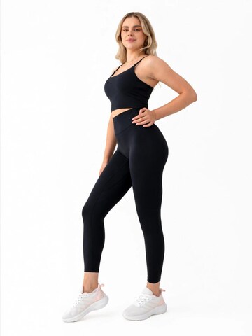 2SKIN - Slimfit Pantalón deportivo en negro