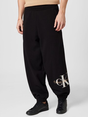 Calvin Klein Jeans - Tapered Pantalón 'Archival' en negro: frente