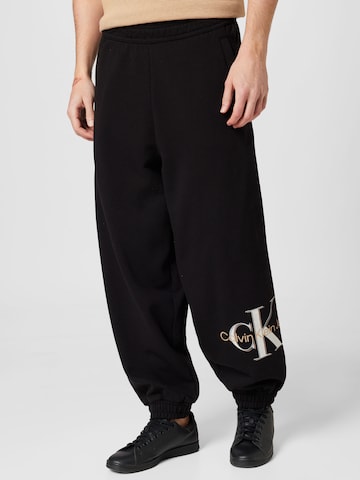 Calvin Klein Jeans - Tapered Pantalón 'Archival' en negro: frente