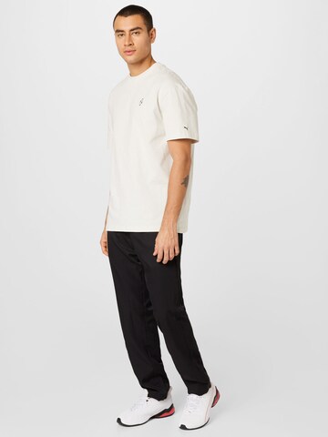 PUMA Regular Sports trousers in Black
