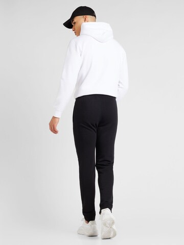 Champion Authentic Athletic Apparel Tapered Broek in Zwart