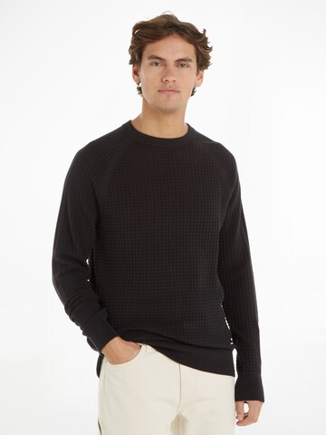 Pull-over Calvin Klein en noir : devant