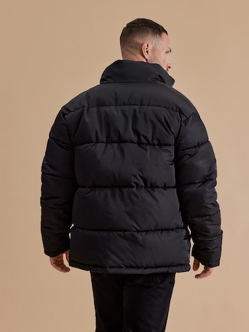 DAN FOX APPAREL Winter jacket 'Hanno' in Black