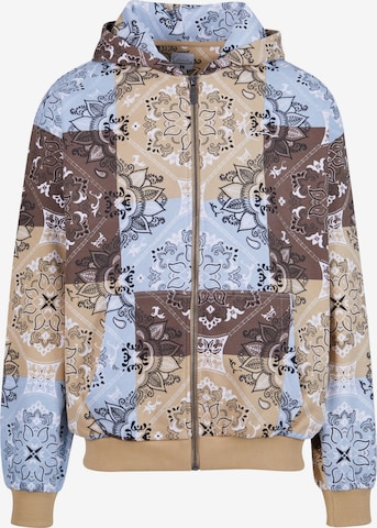 Veste de survêtement Karl Kani en beige : devant