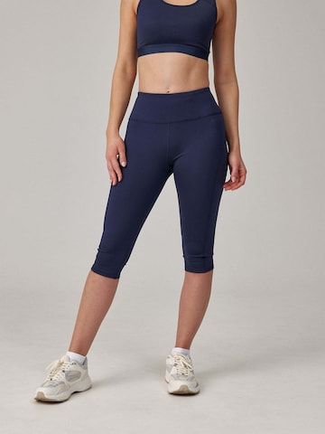SNOCKS Skinny Sportbroek in Blauw: voorkant