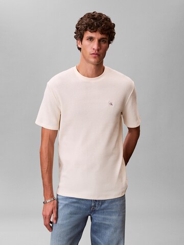 T-Shirt Calvin Klein Jeans en beige : devant