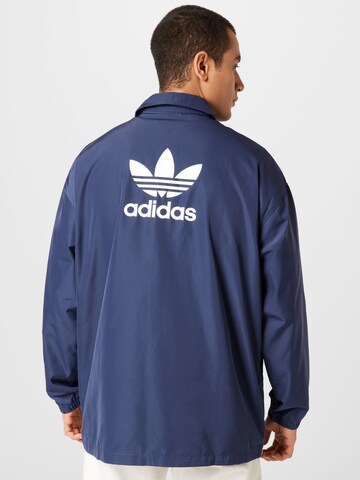 ADIDAS ORIGINALS Regular fit Prehodna jakna | modra barva