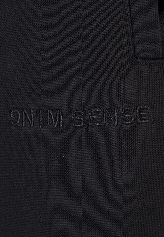 9N1M SENSE Slimfit Hose in Schwarz