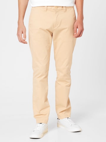 Tommy Jeans Slim fit Chino Pants 'AUSTIN' in Beige: front