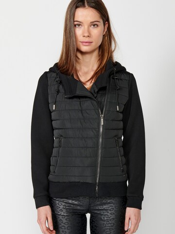 KOROSHI Välikausitakki värissä musta: etupuoli