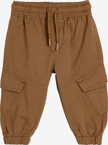 Koton Trousers in Brown: front