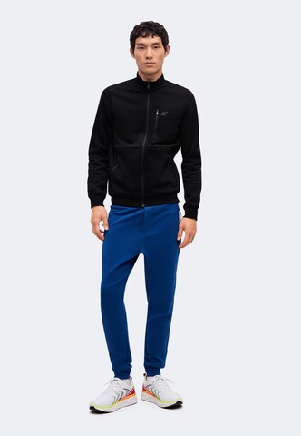 Tapered Pantaloni sport de la 4F pe albastru: față