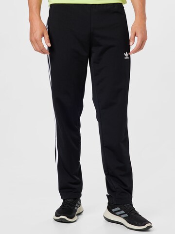 ADIDAS SPORTSWEAR Regular Workout Pants 'Tiro Essential' in Black: front