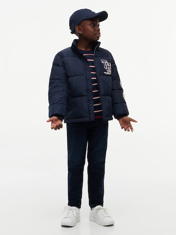 TOMMY HILFIGER Tussenjas in Blauw