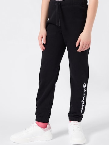 Champion Authentic Athletic Apparel Tapered Trousers in Black: front