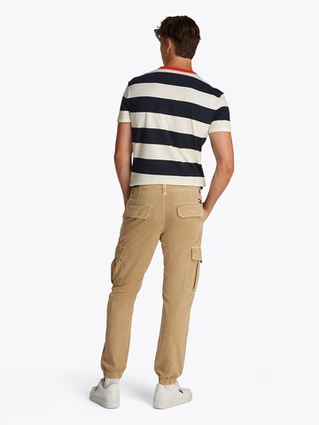 Tapered Pantaloni cargo 'RYAN' di Tommy Jeans in beige