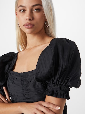 FRAME - Blusa en negro