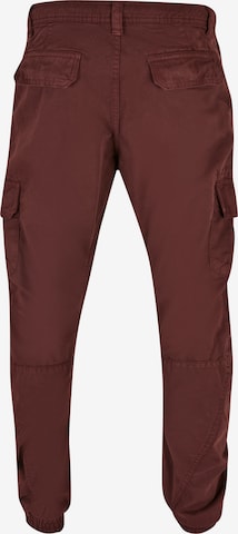 Effilé Pantalon cargo Urban Classics en rouge