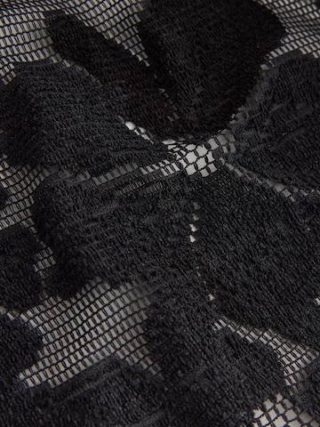 T-shirt Next en noir