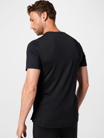 T-Shirt fonctionnel Reebok en noir