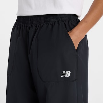 new balance Loosefit Sporthose in Schwarz