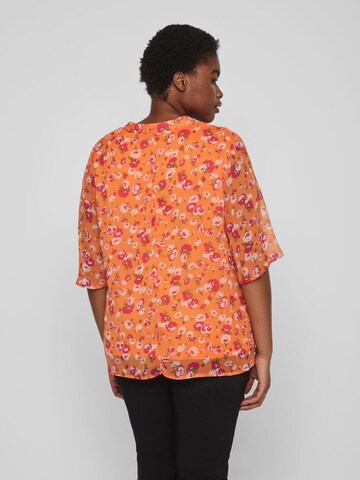 EVOKED - Blusa 'Falia' em laranja