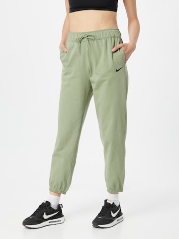 Tapered Pantaloni de la Nike Sportswear pe verde: față