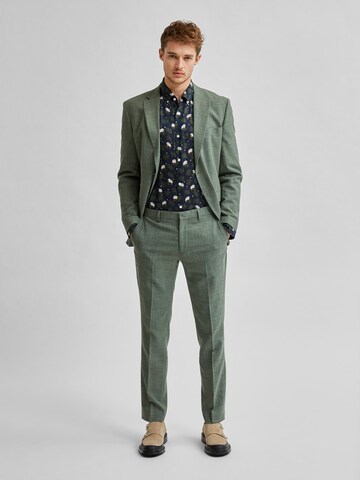 Coupe slim Pantalon à plis 'Oasis' SELECTED HOMME en vert