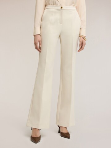 MOTIVI Flared Trousers in White
