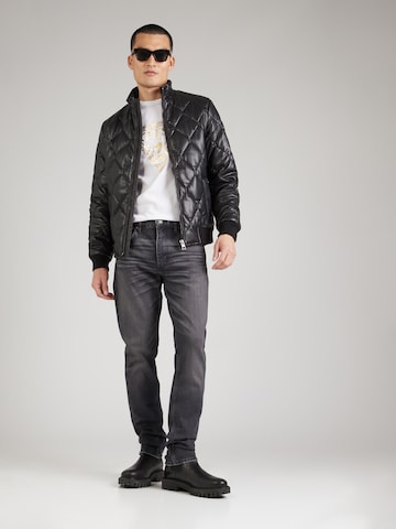 GUESS JEANS Slimfit Farkut värissä musta