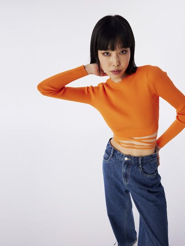 Twist Sweater in Orange