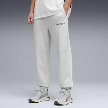 Effilé Pantalon de sport PUMA en gris