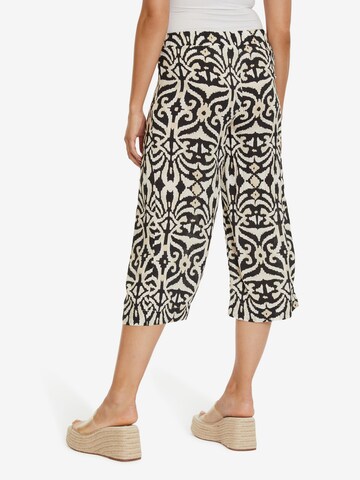 Wide leg Pantaloni de la Cartoon pe bej