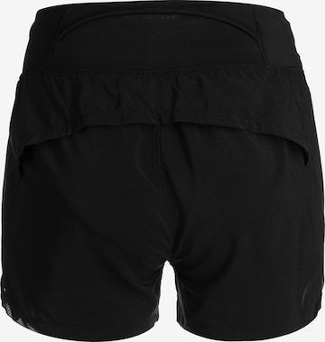 Skinny Pantalon de sport 'Run Stamina' UNDER ARMOUR en noir