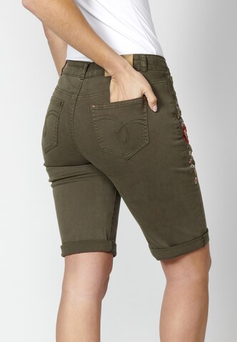 Regular Jeans de la KOROSHI pe verde