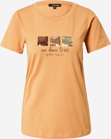 MORE & MORE - Camiseta en naranja: frente