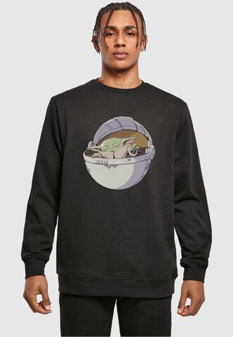 Sweat-shirt 'Star Wars - The Mandalorian' ABSOLUTE CULT en noir : devant