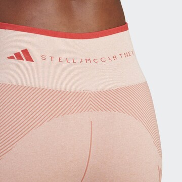Skinny Pantalon de sport 'True Strength' ADIDAS BY STELLA MCCARTNEY en orange