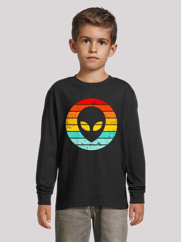 T-Shirt 'Alien Retro Sonnenuntergang' F4NT4STIC en noir : devant