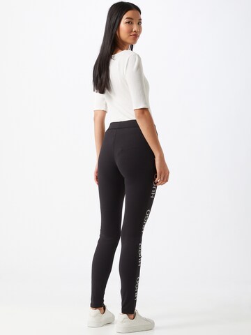 HUGO Skinny Leggings 'Neflective' - fekete