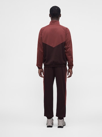 Nike SportswearJogging komplet - crvena boja