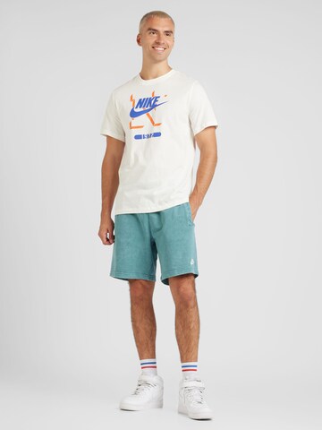 Nike Sportswear - Camiseta 'FUTURA' en beige