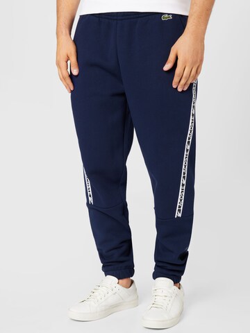 LACOSTE Tapered Trousers in Blue: front