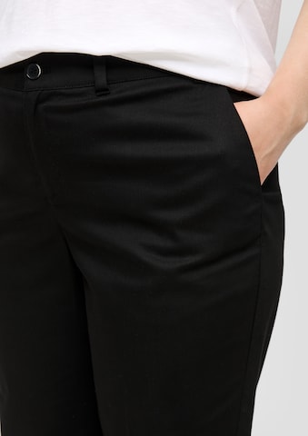 Tapered Pantaloni di s.Oliver in nero