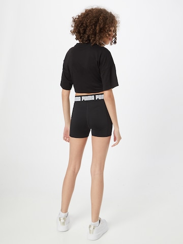 Skinny Pantaloni sportivi di PUMA in nero