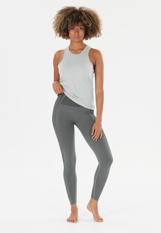 Athlecia Skinny Sports trousers in Green