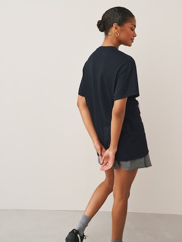 Next Oversized paita 'Kpop Demon Hunters' värissä musta